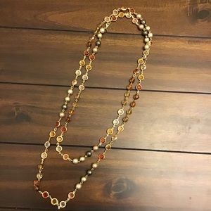 Necklace with yellow, coral beads and pearls.